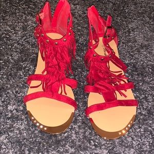 Red open toed sandals